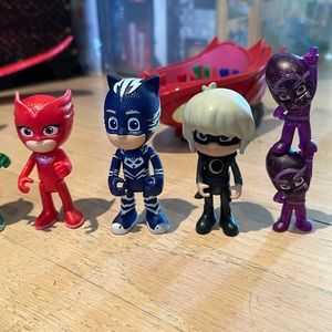PJ masks figures and Owlette flyer.